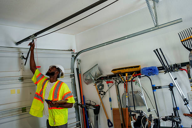 Professional Garage Door Panel Replacement technician working in West Glendive, MT